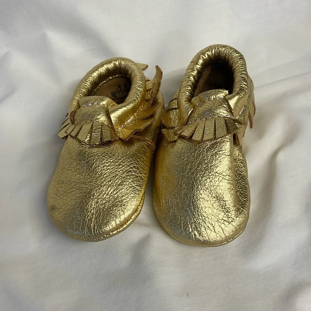 Infants Gold moccasin shoes size 3 months